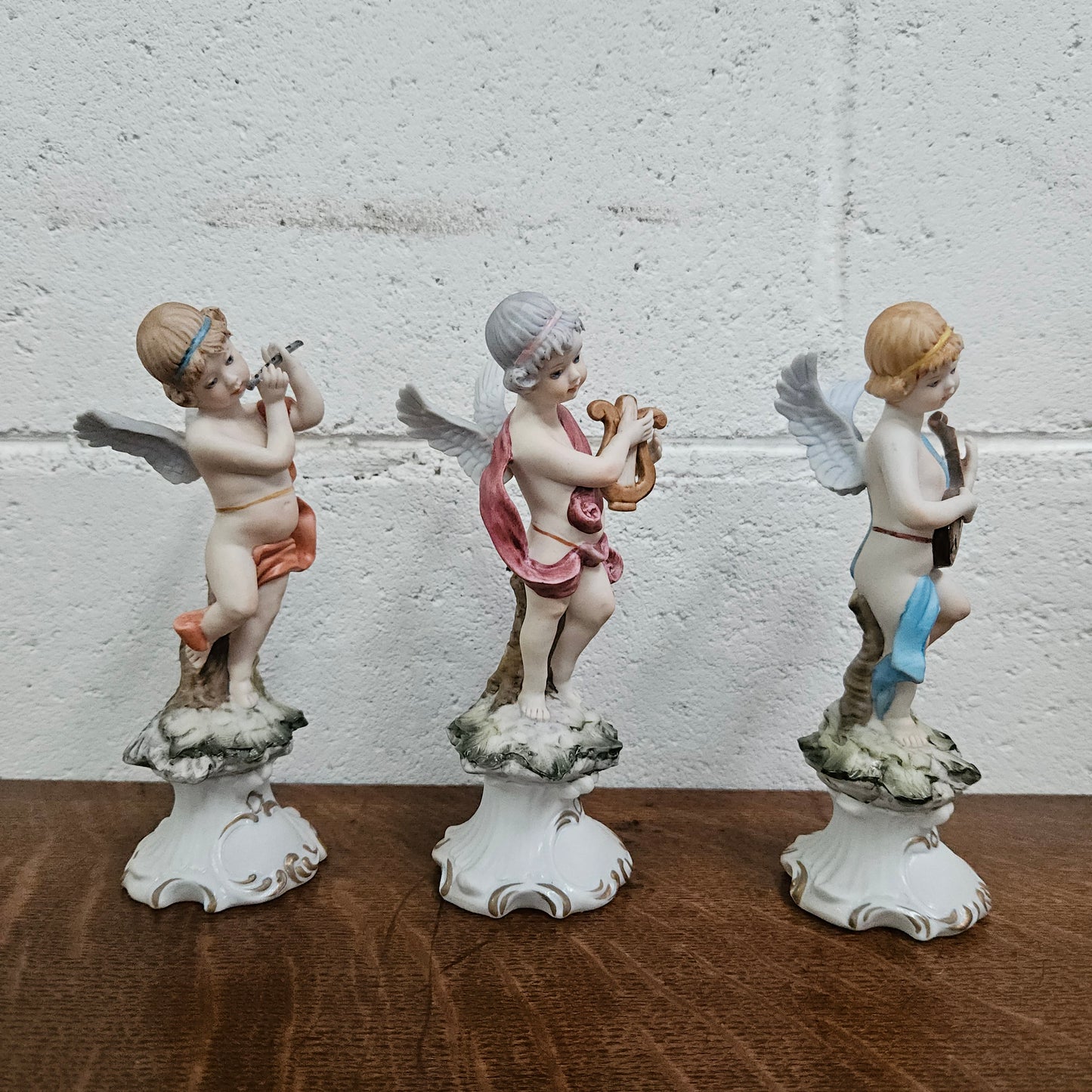Set of Three Capodimonte Angle Figurines