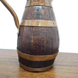 Antique miniature copper and French Oak jug. Hard to find and has been sourced directly from France. In good original detailed condition.