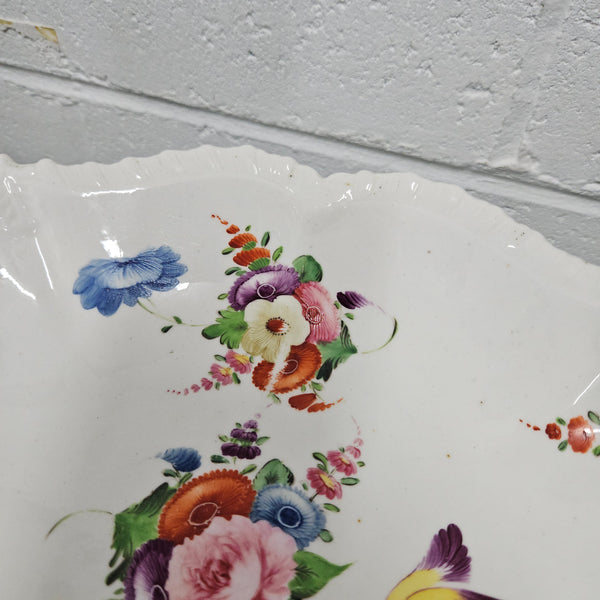 Lovely antique Coalport comport with a floral design 1830's , it is in good original condition with some faults under the bowl during the making. 