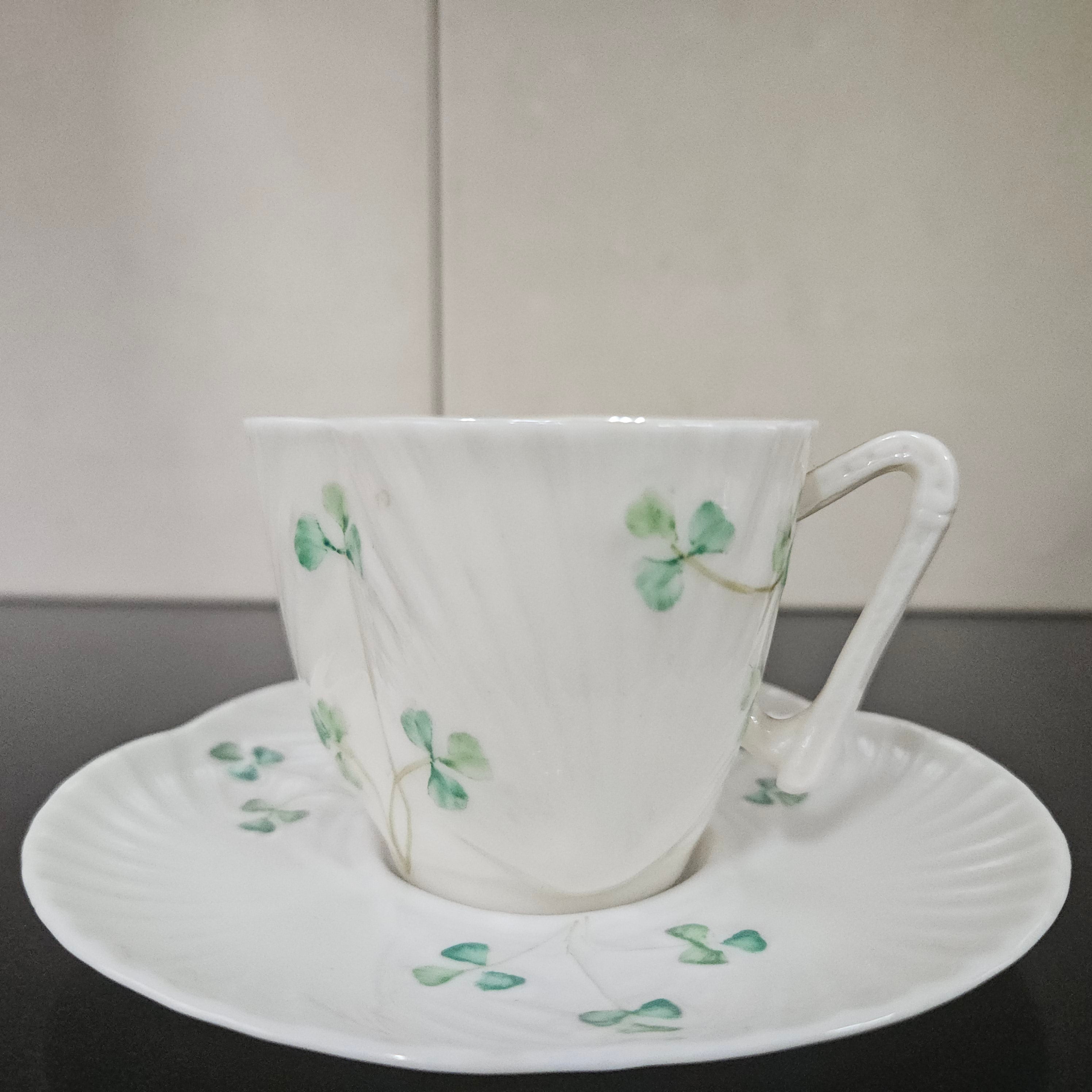 Belleek Coffee Cup and Saucer In Shell Pattern