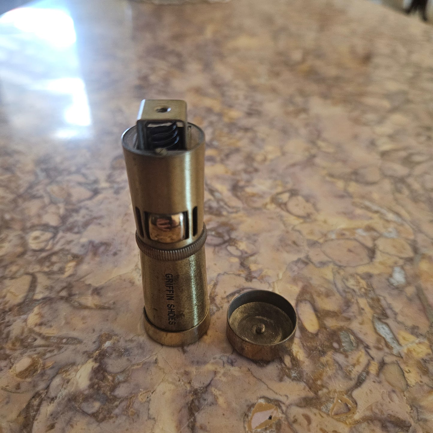 Vintage Ladies Squeeze Automatic Petrol Lighter. Advertising "Griffin Shoes".