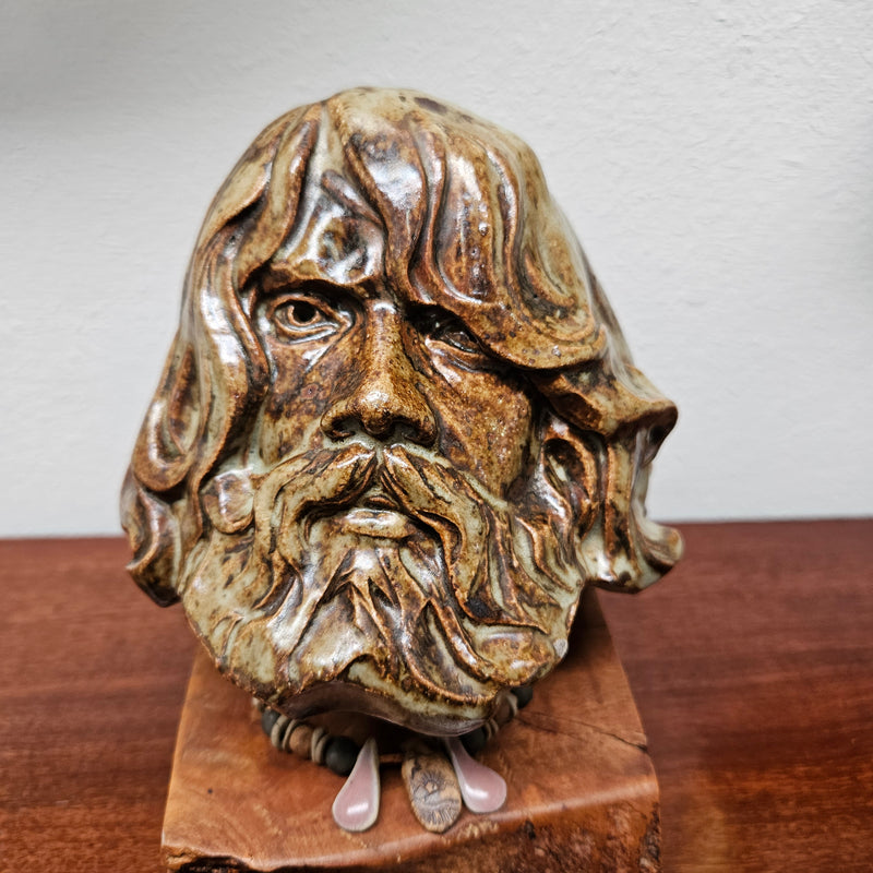 Impressive vintage pottery bust of a man on a wooden base. It is in good original condition and quite heavy. Please see photos as they form part of the description.