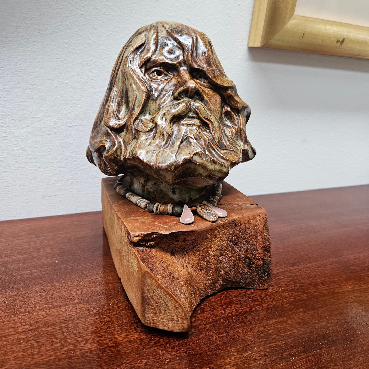 Impressive vintage pottery bust of a man on a wooden base. It is in good original condition and quite heavy. Please see photos as they form part of the description.