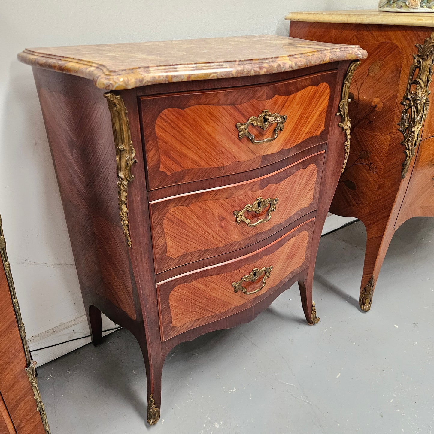 Attractive  Louis XVth Style Marble Top Commode of Medium Proportions.