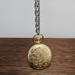 Estee Lauder Gold Tone Compact Pendant