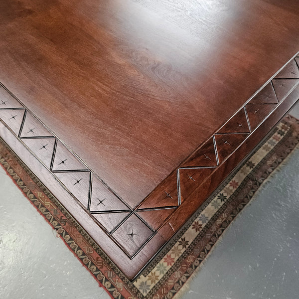 Vintage walnut Spanish style farmhouse table with a beautiful top and iron work. It is in good restored condition. Circa 1950'S.