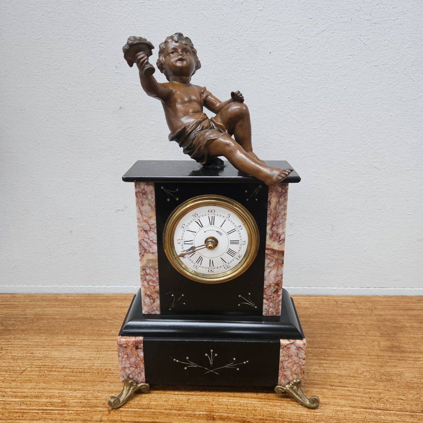 Antique French Mantle Clock Featuring Cherub