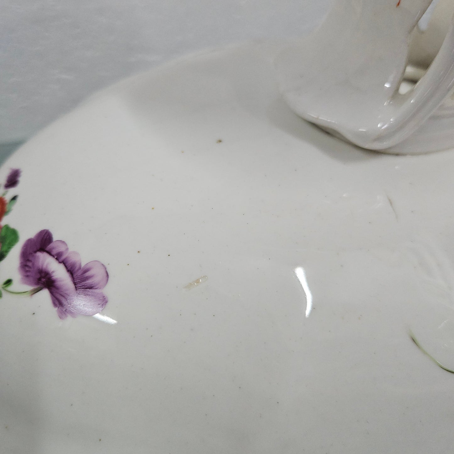 Lovely antique Coalport comport with a floral design 1830's , it is in good original condition with some faults under the bowl during the making. 