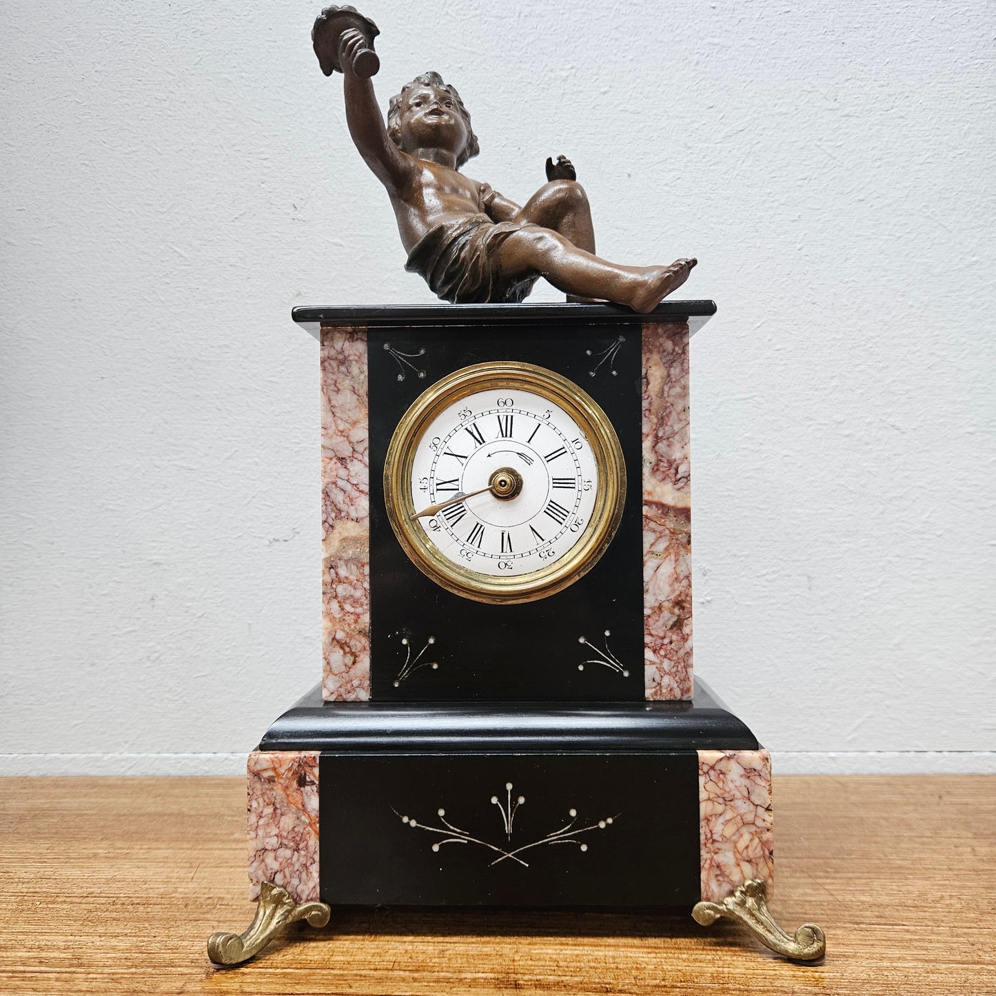 Antique French Mantle Clock Featuring Cherub