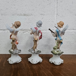 Set of Three Capodimonte Angle Figurines
