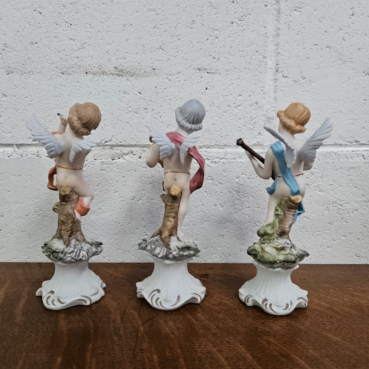 Set of Three Capodimonte Angle Figurines