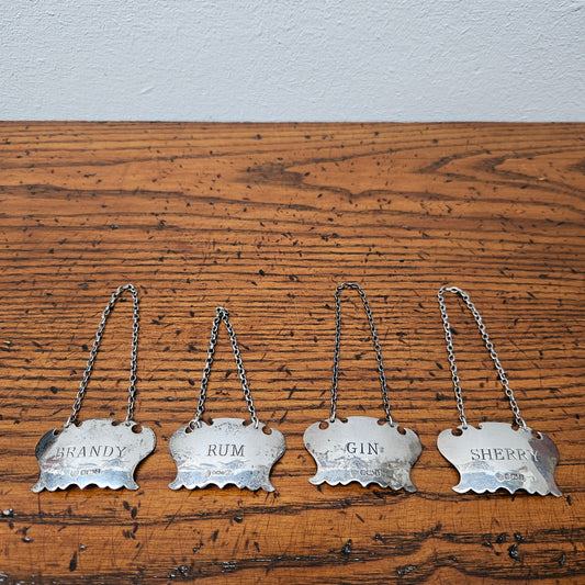 Set of Four Vintage Silver Decanter Labels