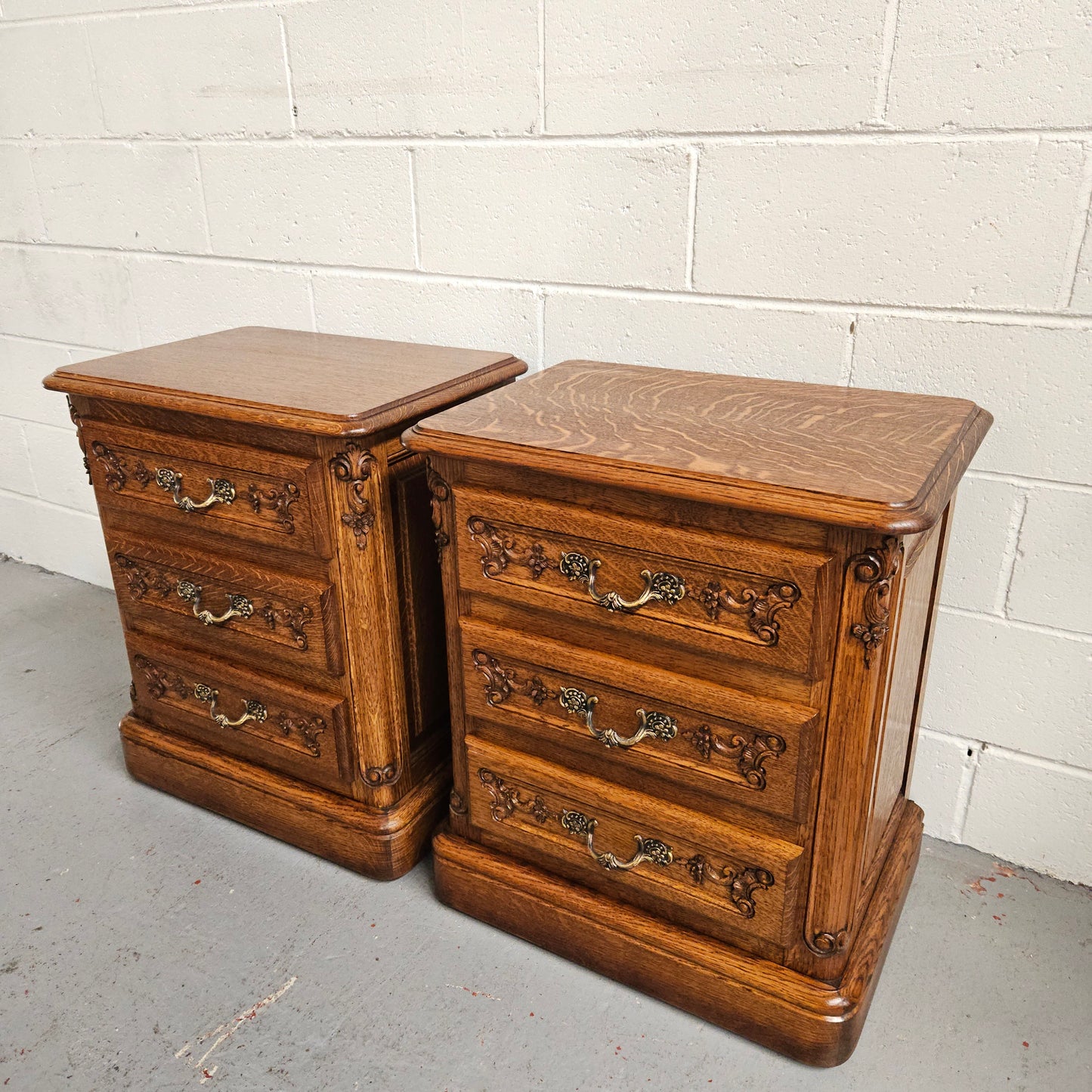 Hard to find Louis XVI style French Oak bedsides with three drawers and lovely carvings. They are in good original detailed condition. 