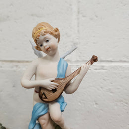 Set of Three Capodimonte Angle Figurines