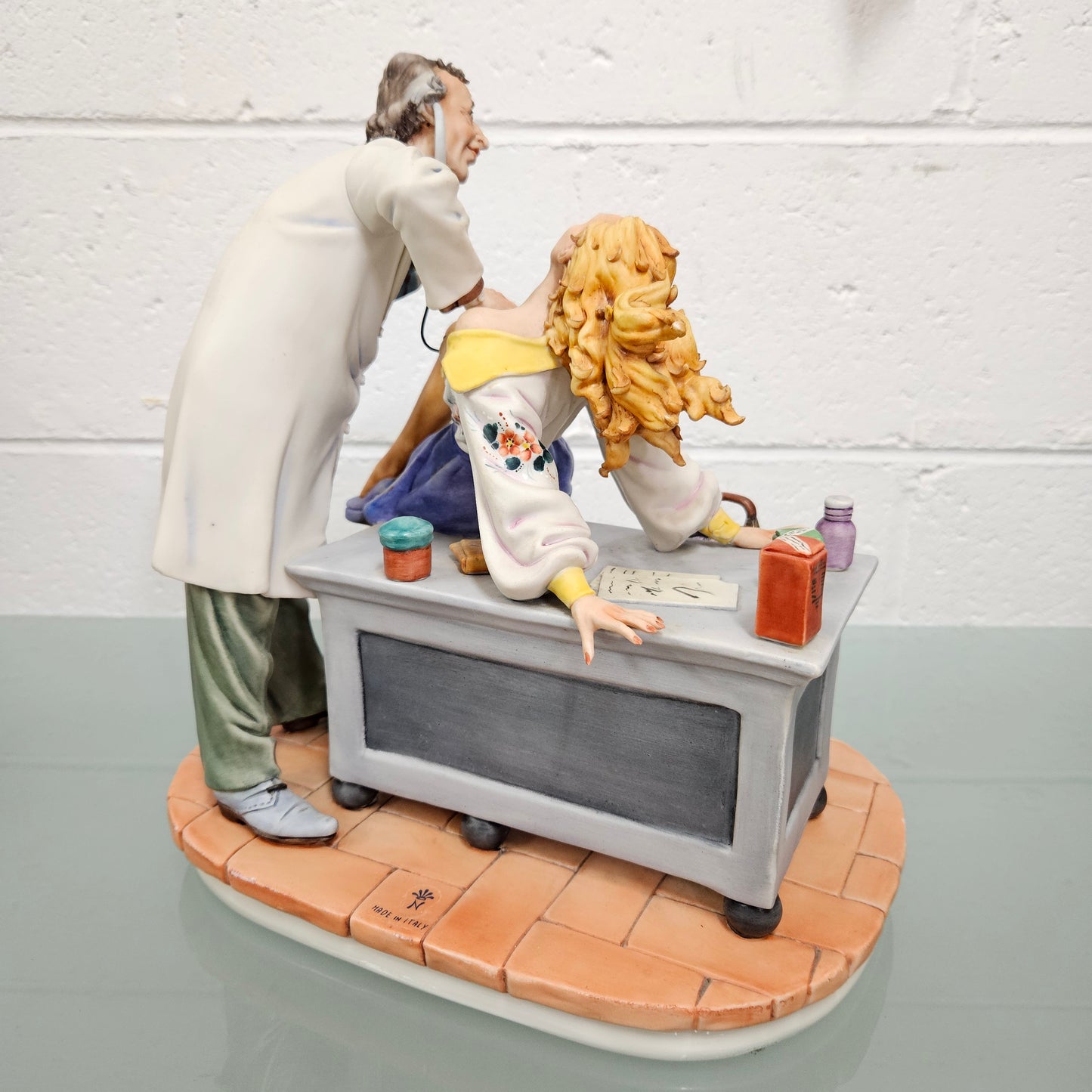 Risque Capodimonte Doctor & Patient Porcelain Statue