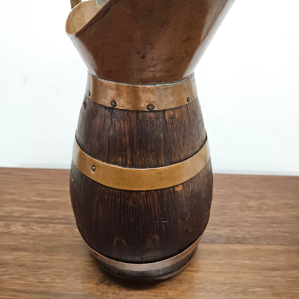 Antique miniature copper and French Oak jug. Hard to find and has been sourced directly from France. In good original detailed condition.