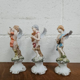 Set of Three Capodimonte Angle Figurines