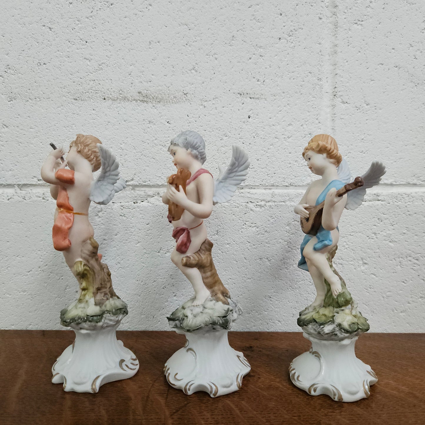 Set of Three Capodimonte Angle Figurines