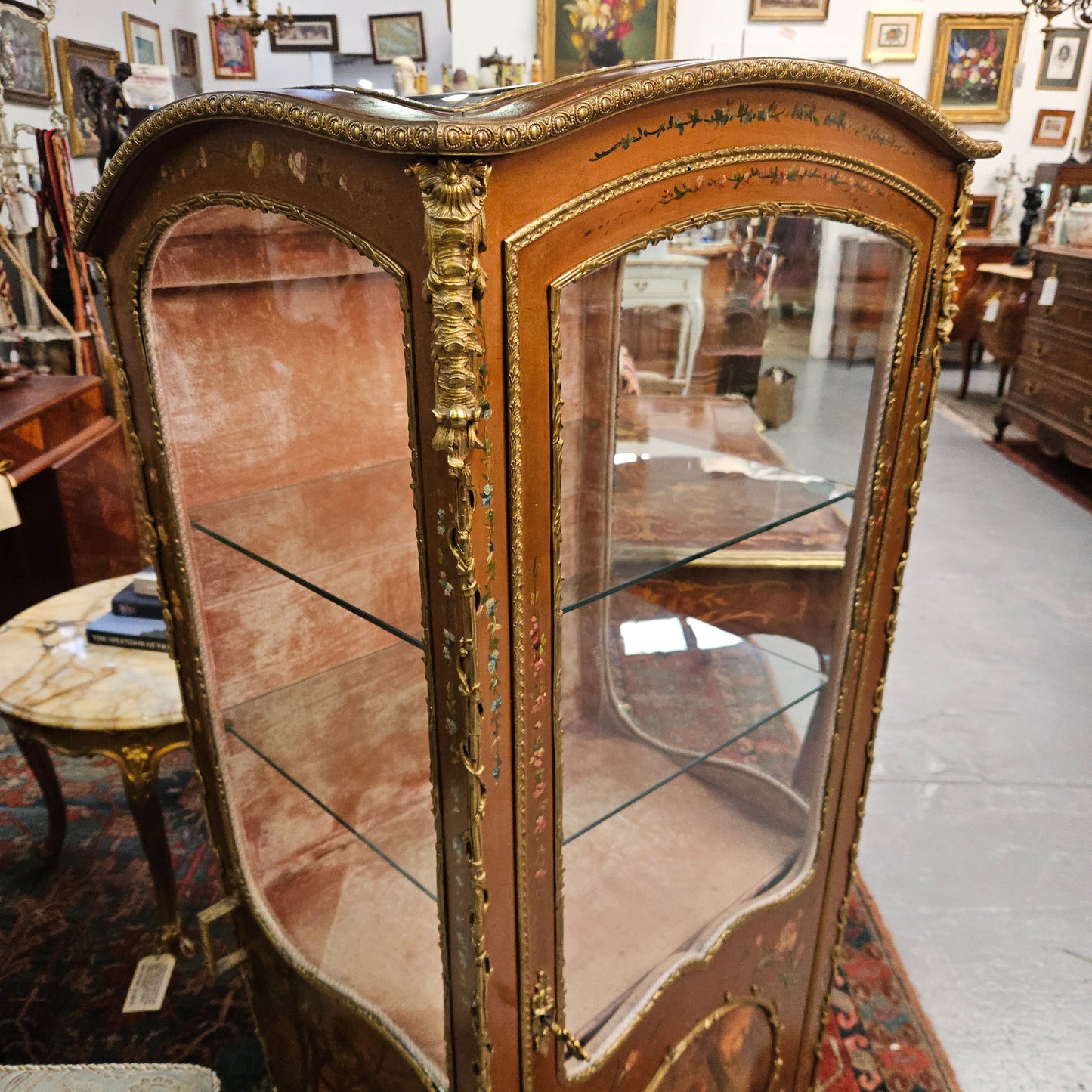 Stunning Rare 19th Century French Salon style vitrine/display cabinet. It has beautifully hand-painted panels and decoration all over with the original two glass shelves inside. It is circa 1900. In very good restored condition. 