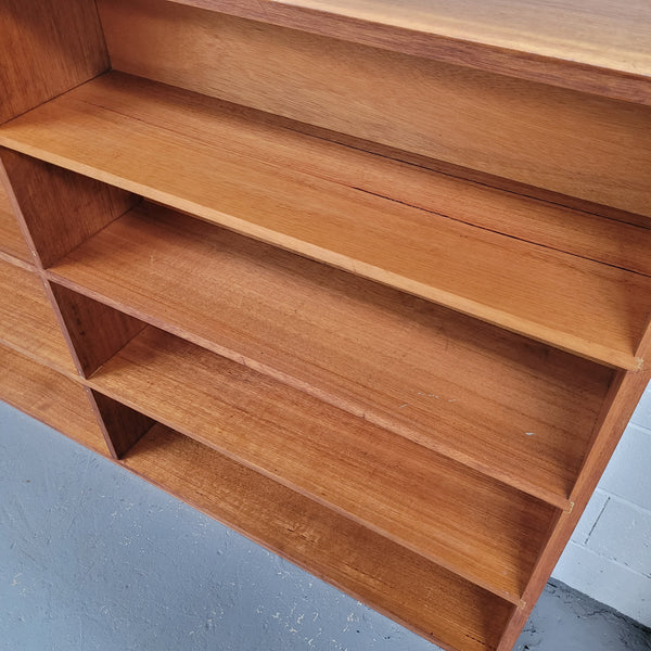 Australian Vic Ash double open bookcase with eight fixed shelves of pleasing narrow proportions. Sourced locally and in good original condition. Please view photos as they help form part of the description and condition.