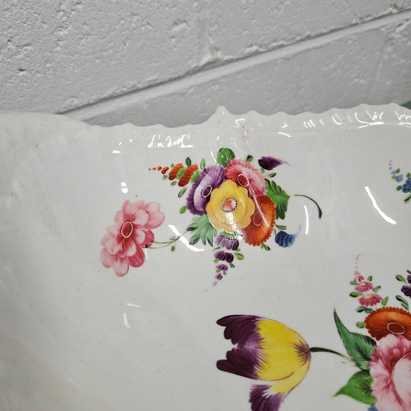 Lovely antique Coalport comport with a floral design 1830's , it is in good original condition with some faults under the bowl during the making. 