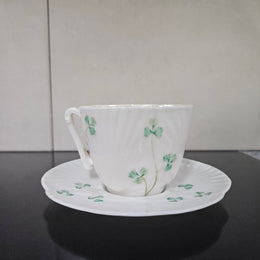 Belleek Coffee Cup and Saucer In Shell Pattern