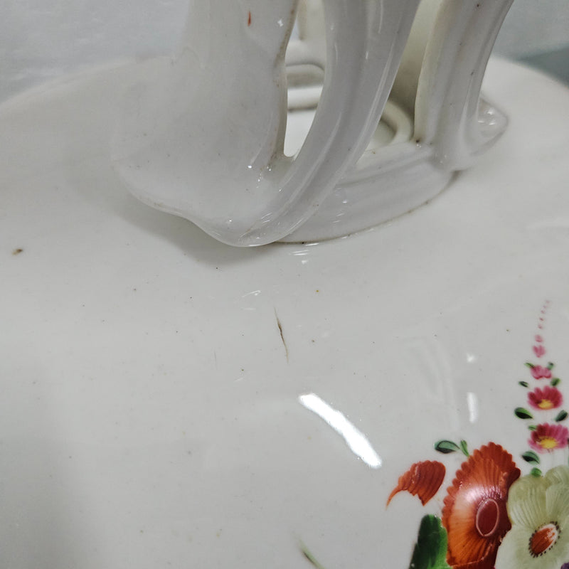 Lovely antique Coalport comport with a floral design 1830's , it is in good original condition with some faults under the bowl during the making. 