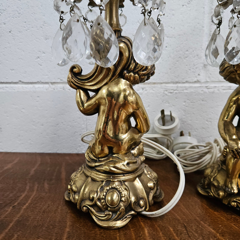 Beautiful pair of vintage gilt cherub lamps. They are both in good working order and wired to Australian standards. Please see photos as they form part of the description 