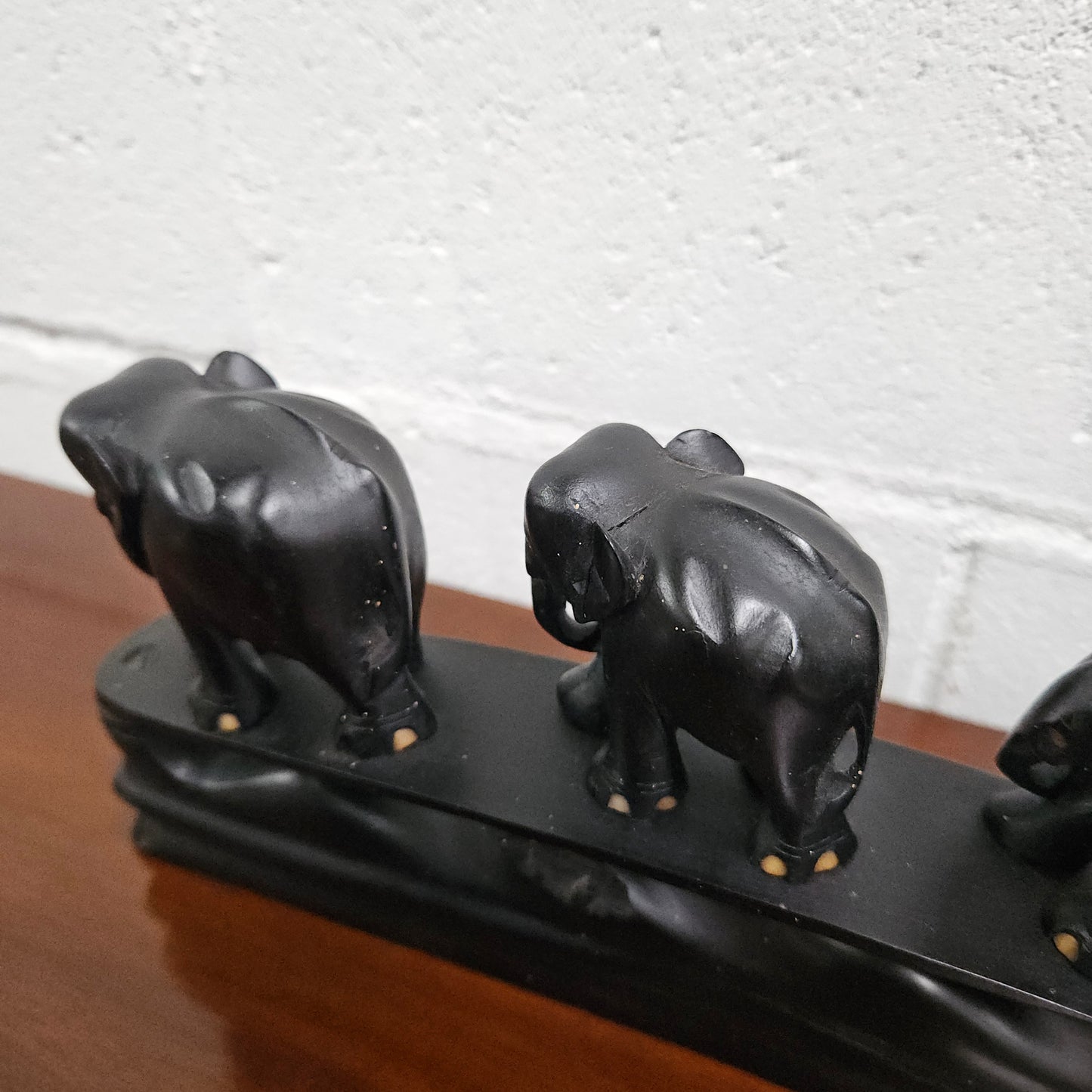 Vintage Ebony Walking Elephants Statue