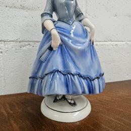 German Porcelain Figurine of a Lady in Blue Dress