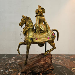 Victorian gilt bronze jeweled lady rider horse on a naturalistic wooden base. Circa 1890 and has a Hidden Compartment.
