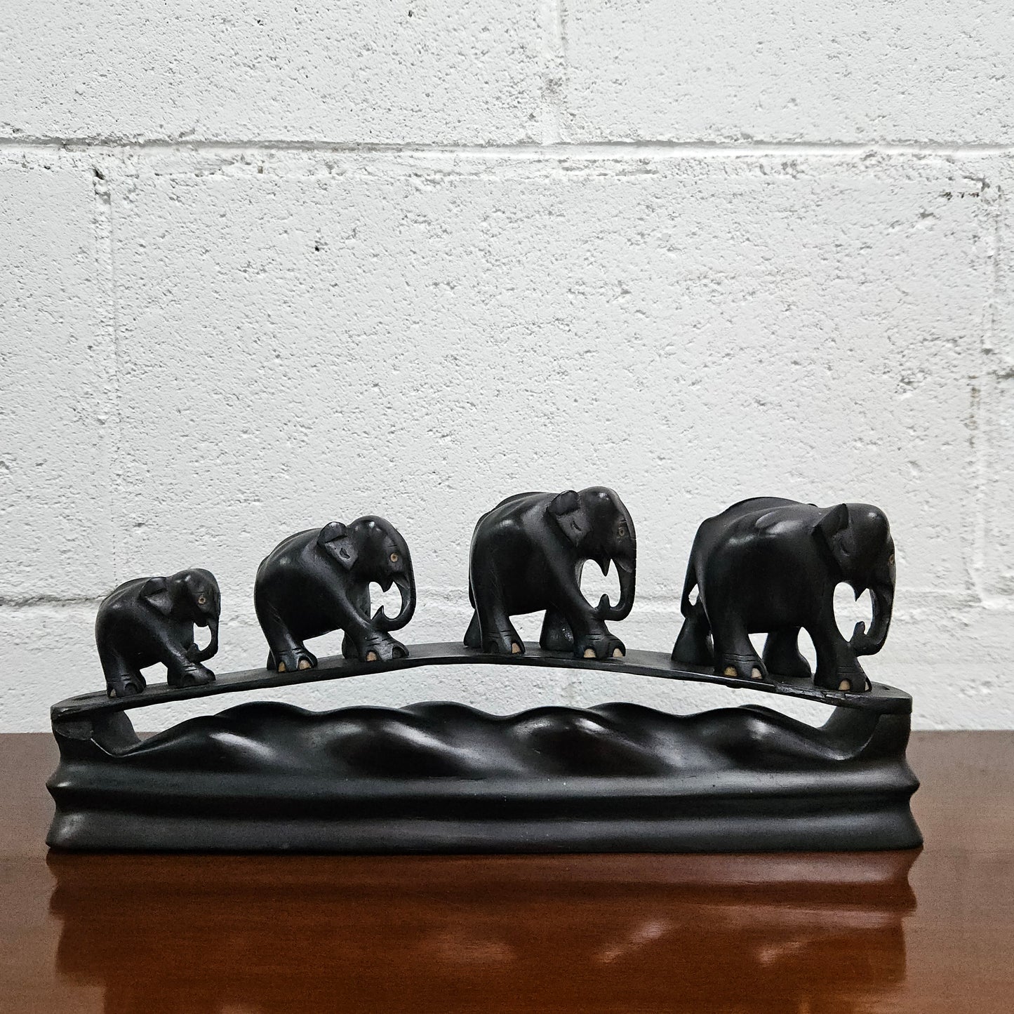 Vintage Ebony Walking Elephants Statue