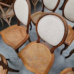 Stunning set of eight French Louis XV style walnut cane seat with upholstered back and ormolu mounts on the legs. Circa 1900. They are in excellent original condition and very comfortable. Please see photos as they form part of the description and condition.