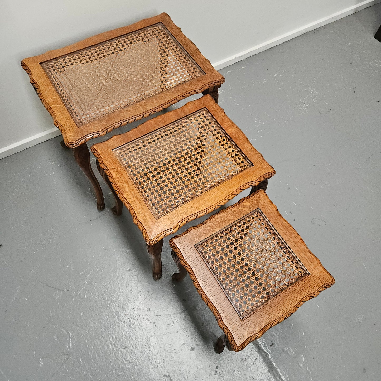 French Oak Three Piece Nest of Tables With Cane Inserts