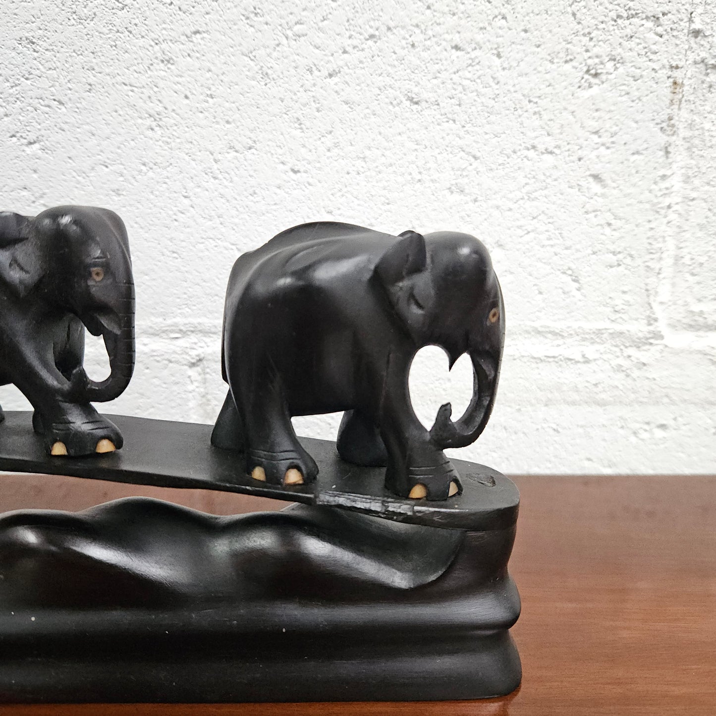 Vintage Ebony Walking Elephants Statue