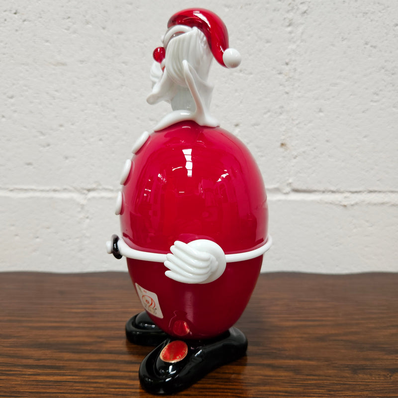 Very rare Murano Glass Christmas clown By Fratelli Pitau. It still has its original sticker and tag. It is in good original condition with no chips or cracks.