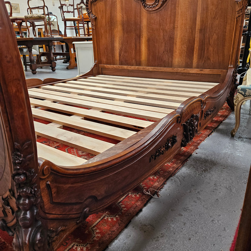 Beautifully carved Antique Louis XV style French Walnut queen size bed. Comes with custom made bed slates. Sourced from France and in good original detailed condition.