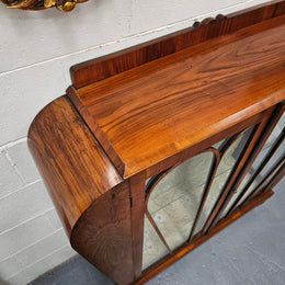 Stunning Art Deco display cabinet with two glass shelfs, Walnut and lockable glass doors. This cabinet is in great original condition for the age.