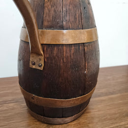 Antique miniature copper and French Oak jug. Hard to find and has been sourced directly from France. In good original detailed condition.