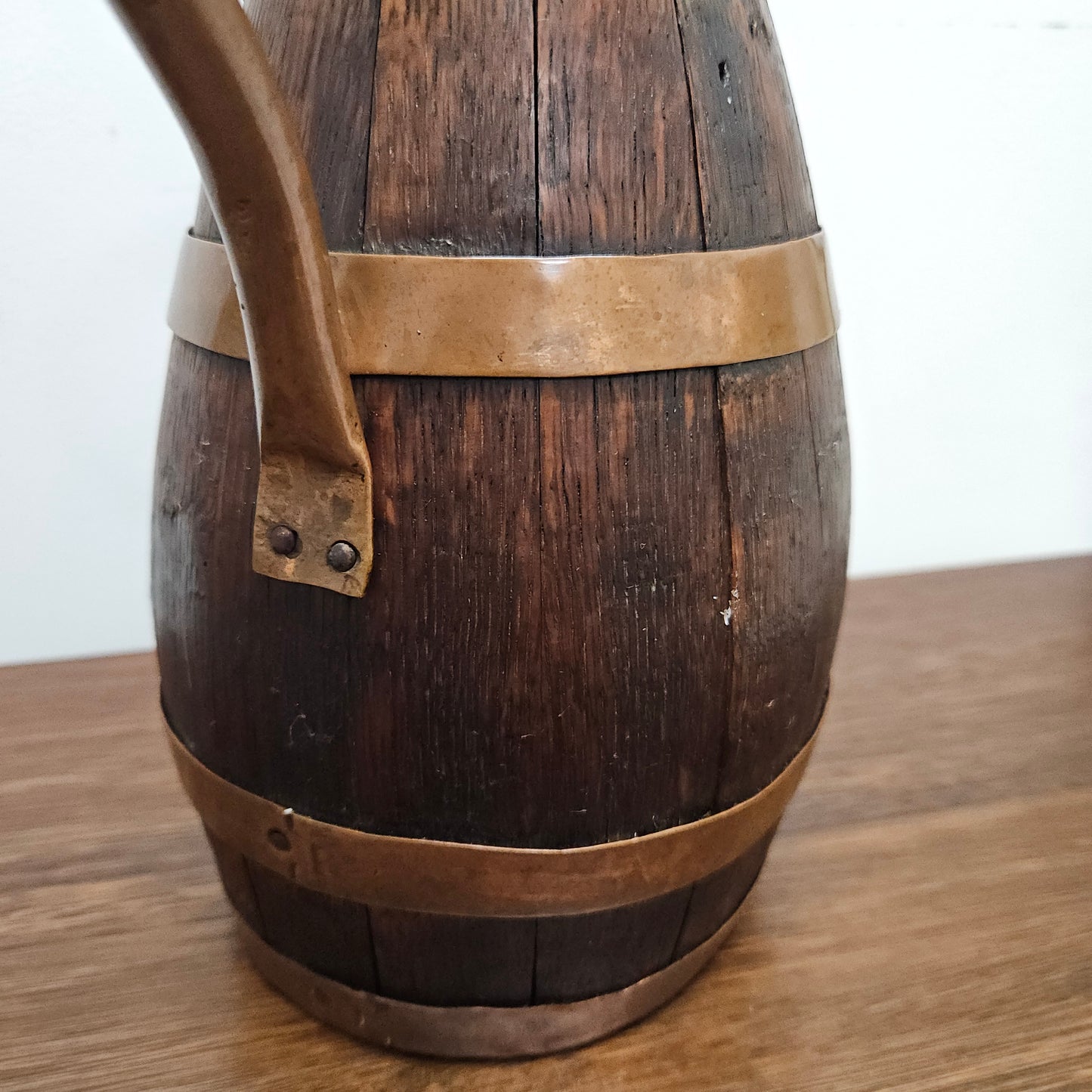 Antique miniature copper and French Oak jug. Hard to find and has been sourced directly from France. In good original detailed condition.
