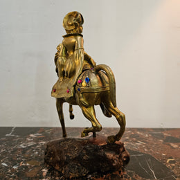 Victorian gilt bronze jeweled lady rider horse on a naturalistic wooden base. Circa 1890 and has a Hidden Compartment.