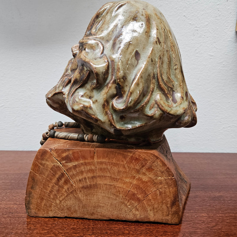 Impressive vintage pottery bust of a man on a wooden base. It is in good original condition and quite heavy. Please see photos as they form part of the description.