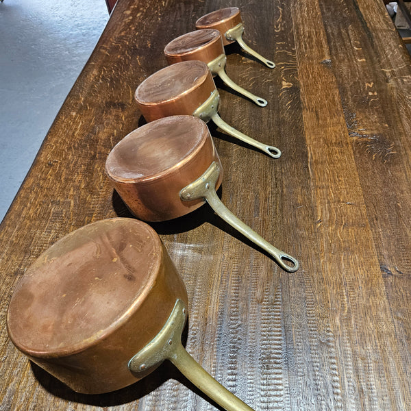 Lovely set of five copper sauce pots, they are all in good original condition for the age. Sourced from France. 