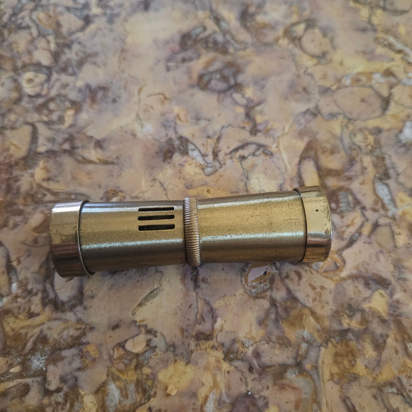 Vintage Ladies Squeeze Automatic Petrol Lighter. Advertising "Griffin Shoes".