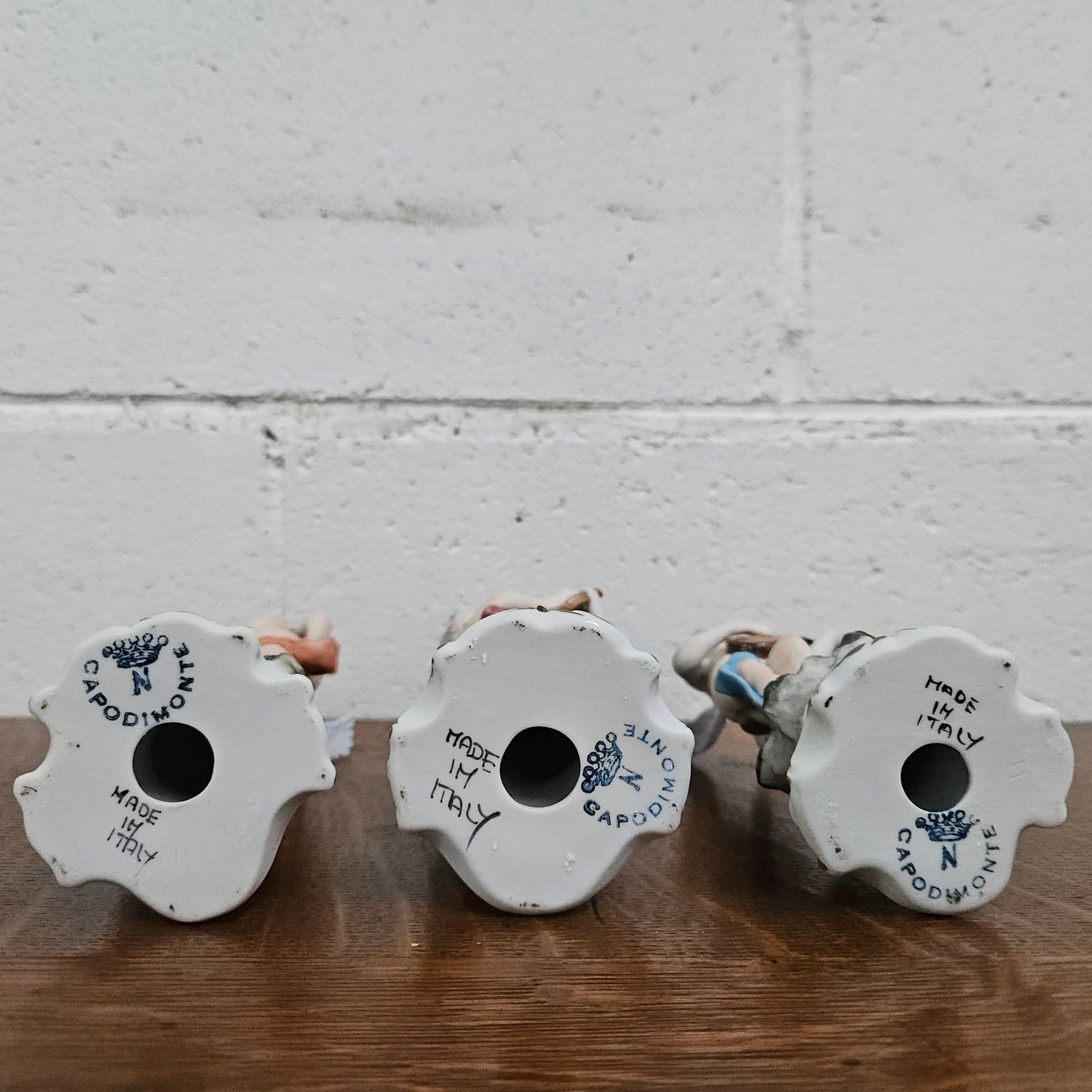 Set of Three Capodimonte Angle Figurines