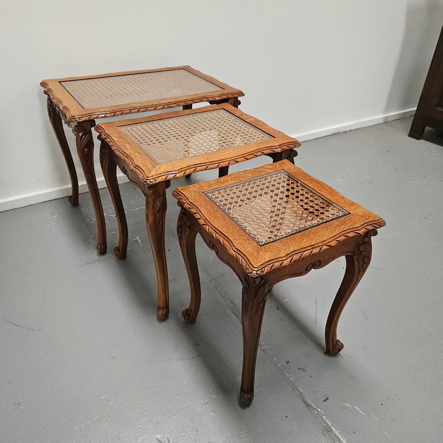 French Oak Three Piece Nest of Tables With Cane Inserts