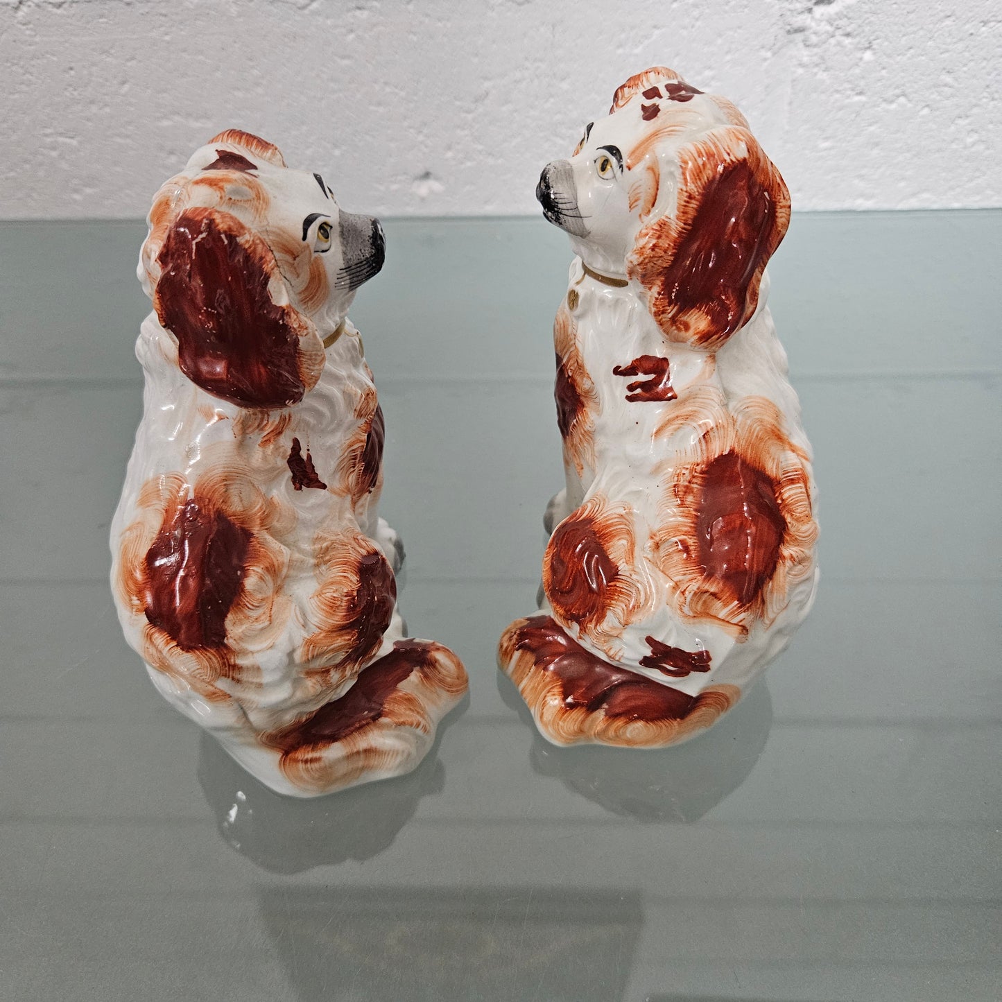 Pair of Antique Staffordshire Spaniels Statues
