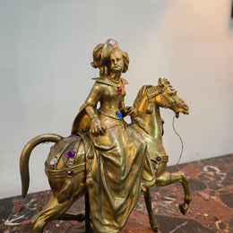 Victorian gilt bronze jeweled lady rider horse on a naturalistic wooden base. Circa 1890 and has a Hidden Compartment.