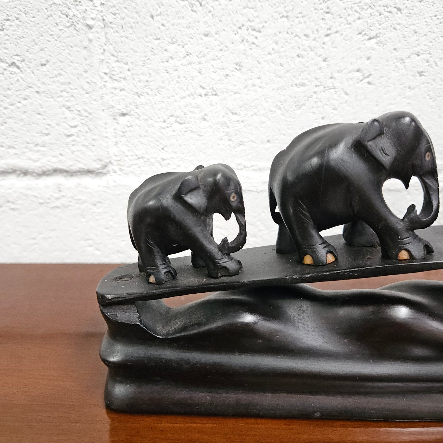 Vintage Ebony Walking Elephants Statue