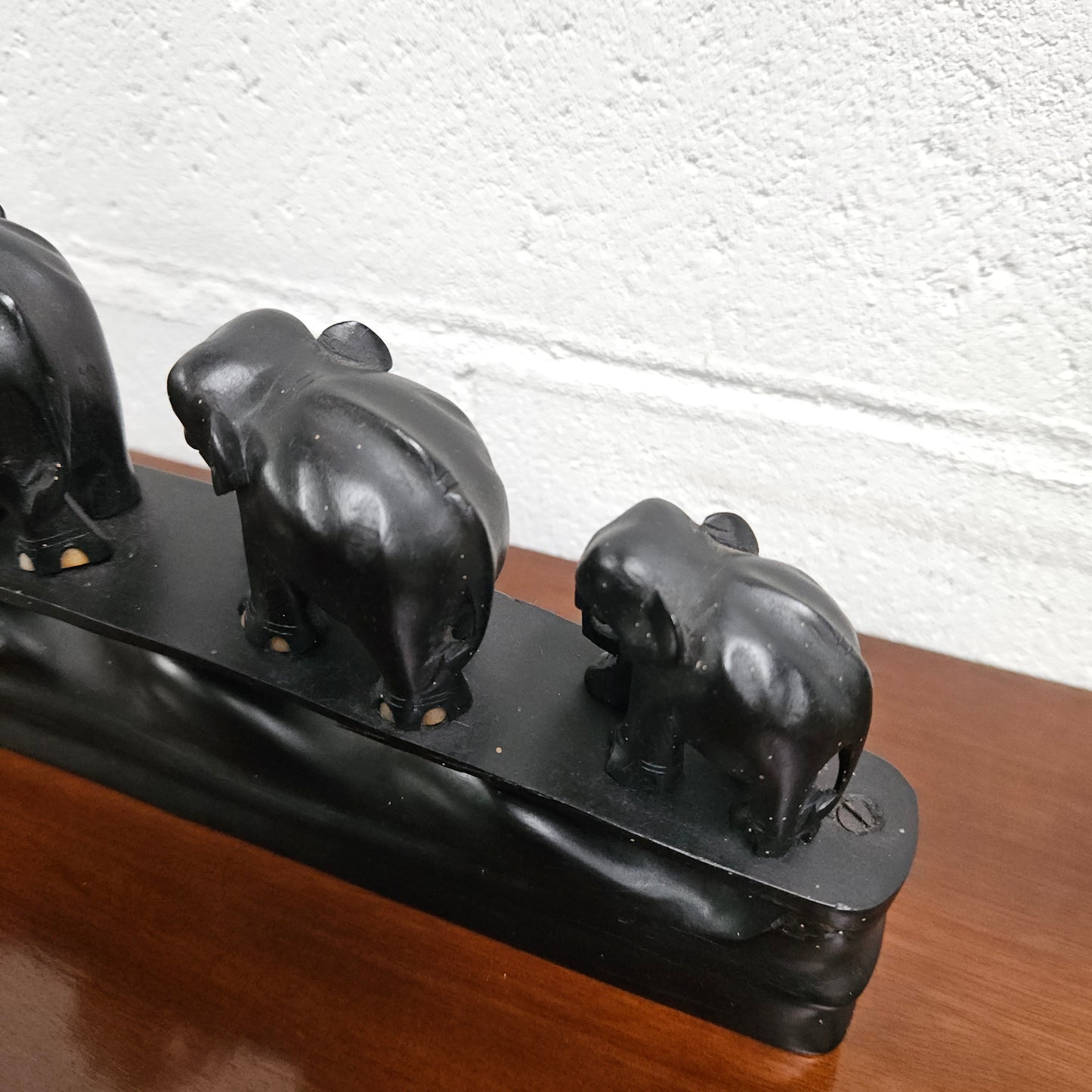 Vintage Ebony Walking Elephants Statue